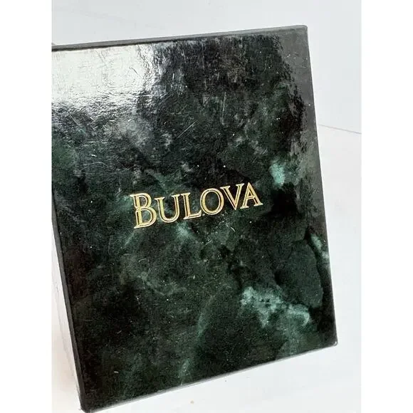 Bulova Men's Gold-Tone Diamond Accent Watch, model number 97D127.